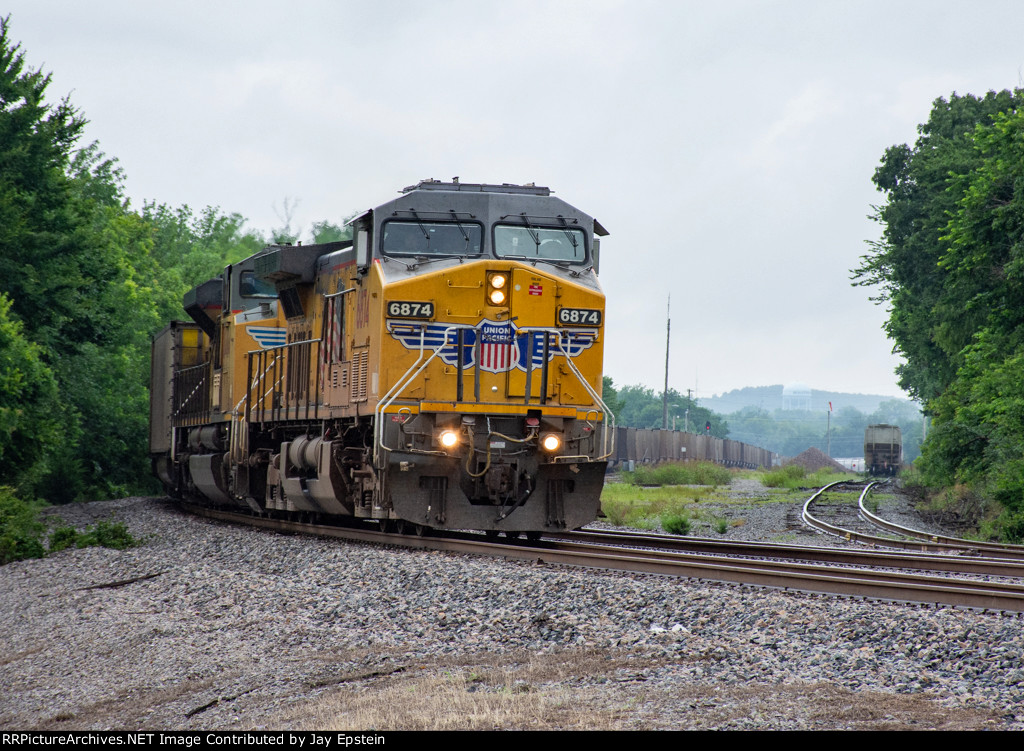 UP 6874 leads an empty coal train north at Ashland Ave